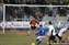10 The Billericay player is clear with a shot on goal as Tommy O comes rushing in......jpg