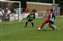 24 but the defender manages to get a foot to the ball.jpg