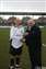 2 Ossie receives his award for 250 appearances for the club from Chairman Dave Skinner.jpg