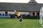 5 But former Dart Steve Williams in the Brickies goal cuts it out.jpg