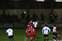 20 The Wings player (Jamie Coyle) gets to the ball before Carl.jpg