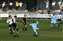 10 Butters lets rip but its blocked by a defender.jpg