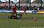 12_Rob nearly sneaks it round Andray Baptiste.jpg