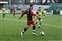 7 Ryan runs with the ball as the Thurrock defender ( Adam Gross) closes him down......jpg