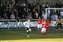 Jamie's chip hits the hand of the player, Penalty! not according to the Ref (Large).jpg