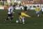 Brendon knocks it past the defender (Large).jpg